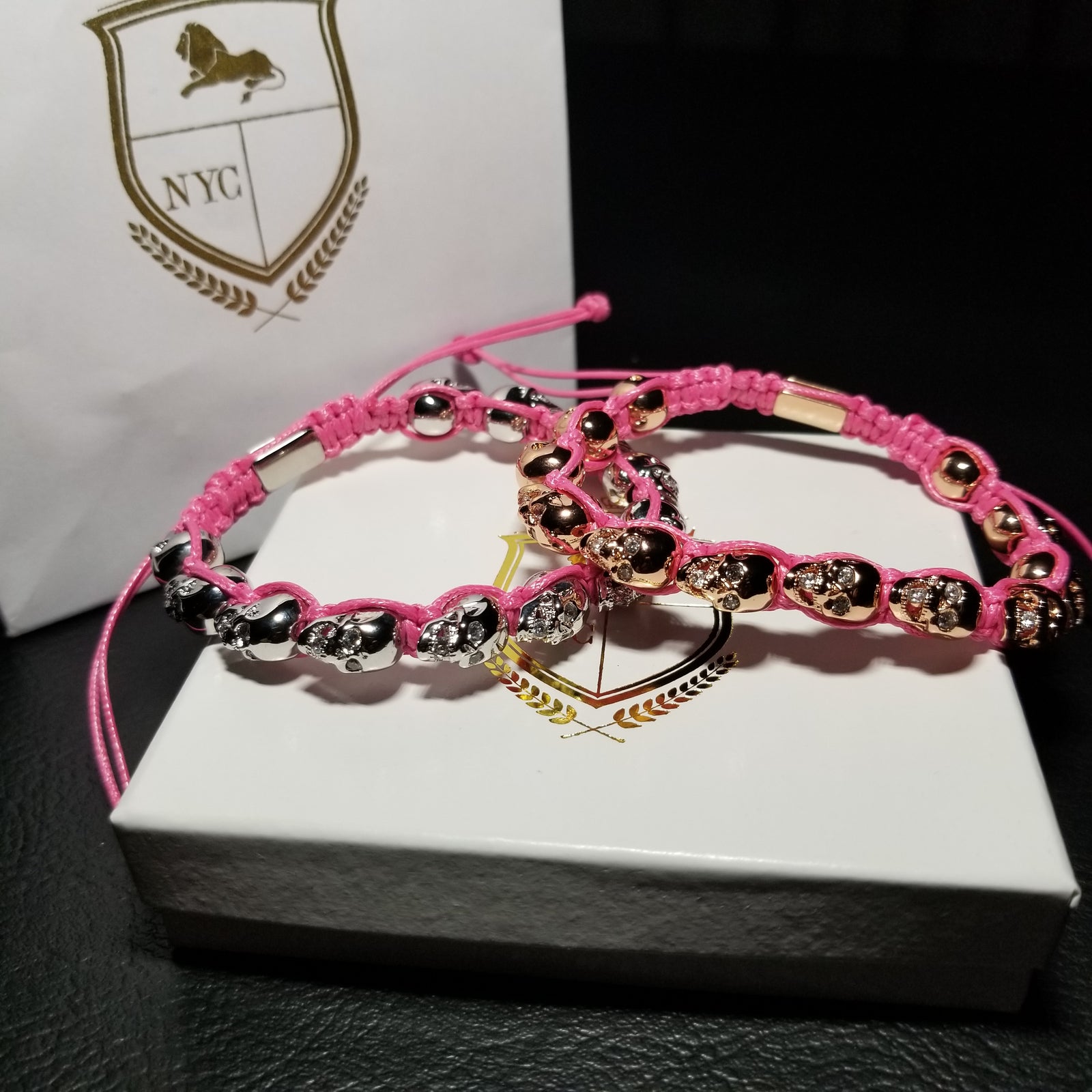 12 Skulls diamond eyes pink bracelet